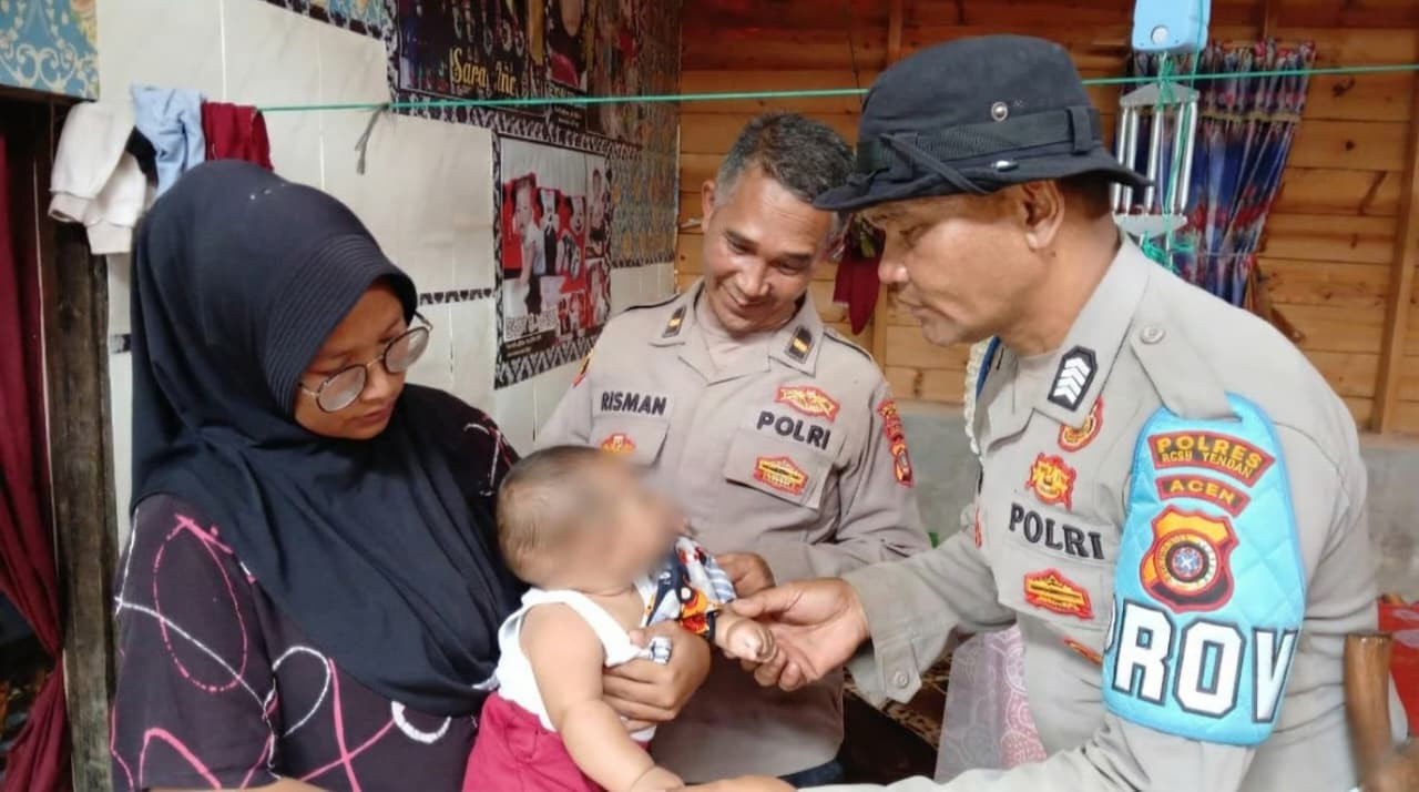 Respon Cepat Polres Aceh Tengah Tembus Wilayah Terisolir, Pastikan Kondisi Bayi Sehat dan Layani Kesehatan Warga
